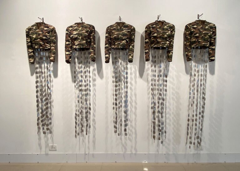 Tayeba Begum Lipi | Untitled | 2010 | Fabric, razor blades, steel paper clips, steel hangers. 5 units | 76 (h) x 16 (w) x 8.5 (d) Inches each