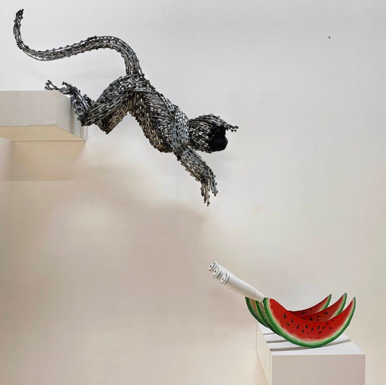 Lakshman Rao Kotturu | Untitled | 2020 | Steel, GI wire, Mesh, Wood & Paint | Monkey: 24 x 35 x 11 Inches | Watermelon: 9.5 x 17.75 x 6 Inches