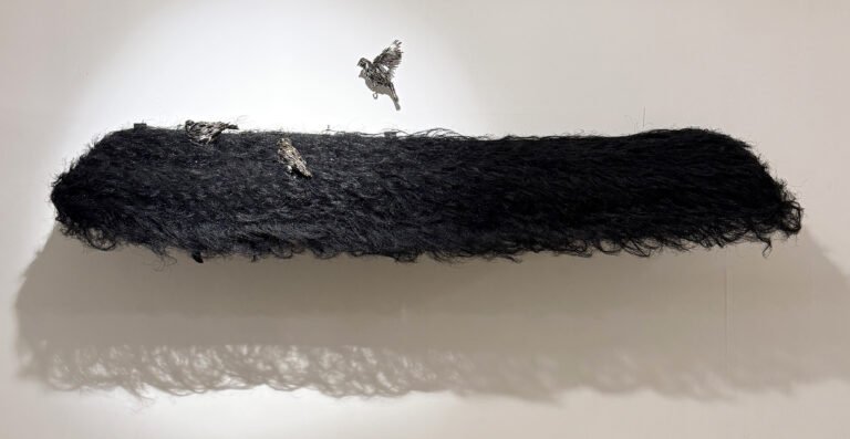 Lakshman Rao Kotturu | Untitled | 2024 | Black mesh, stainless steel fencing wire, readymade sickle and steel | 34(H) x 98(W) x 35(D) Inches