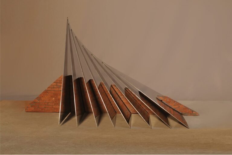 Teja Gavankar | Mountain II | 2025 | Stainless steel, bricks and cement | 12(H) x 30(W) X 12(D) Inches