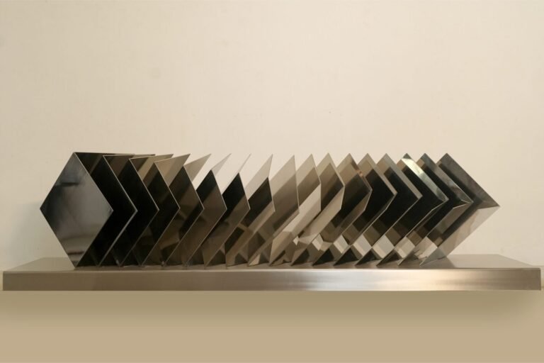 Teja Gavankar | Room II | 2025 | Stainless steel and PU coating | 20(H) x 80(W) x 2(D) Inches