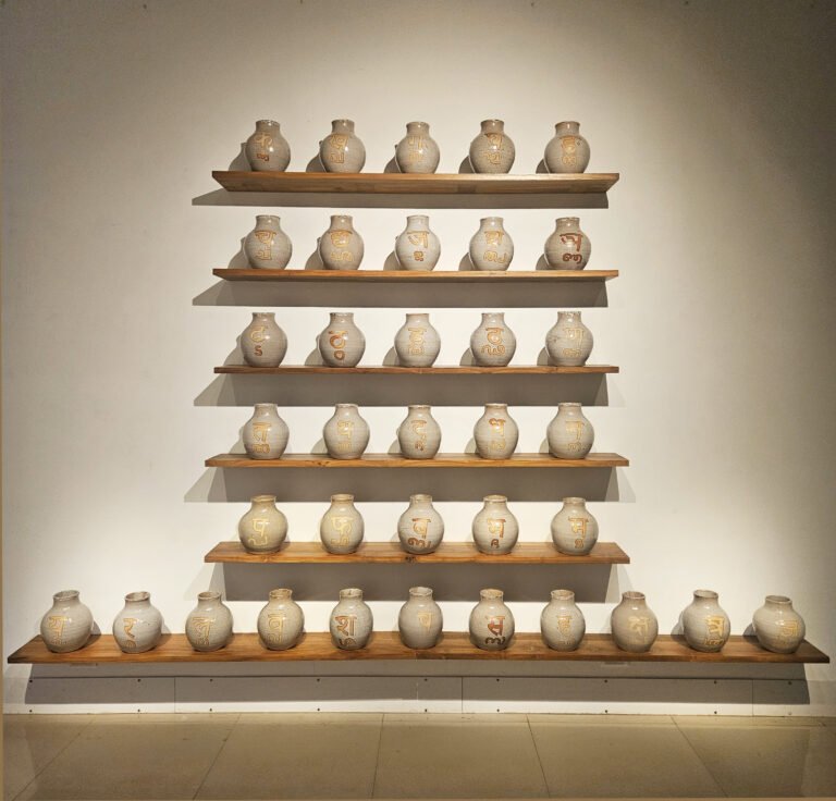 Vivek Vilasini | … and for those who sing their national anthem in somebody else’s mother tongue. “The Unfinished Hindi Lesson” | 2026 | Ceramic (Set of 36 units) | 9(H) x 8(Dia) Inches each