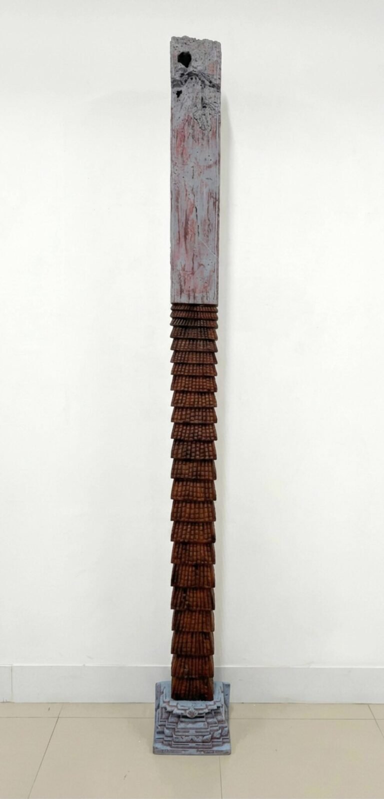Rohit Varekar | Carrying Homes | 2026 | Hand-carved reclaimed wood collected from abandoned and fallen houses in the Konkan region (Set of 2 units) | 92(H) x 11(W) x 6(D) Inches