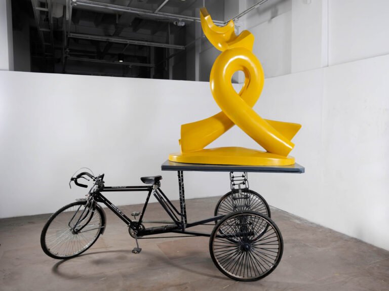 Vivan Sundaram | Spring | 2015 | Painted fiberglass object (after an unfinished sculpture by Ramkinkar Baij) and a bicycle | 66(H) x 60(L) x 30(W) Inches